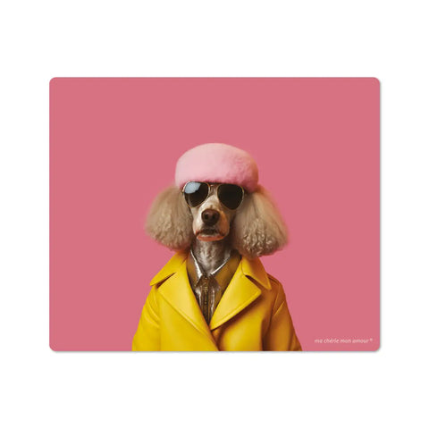 A vinyl mouse pad featuring a whimsical design of a dog wearing a yellow coat and a pink hat.