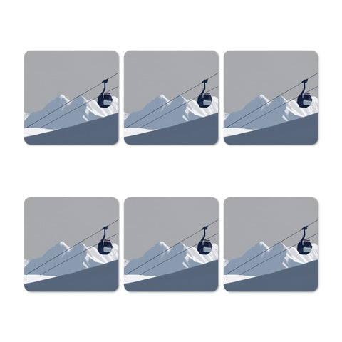 Set of six coasters with mountain and cable car design on a gray background