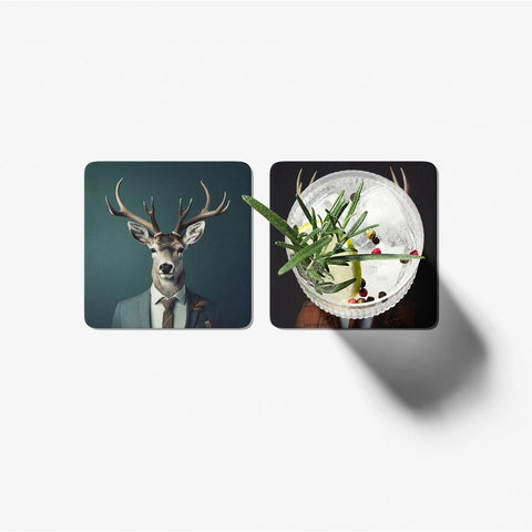 Two coasters with a deer portrait and a cocktail design on a white background
