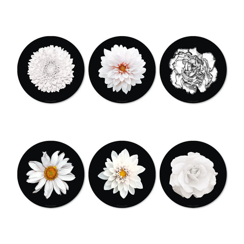 The flower power design patterns on this round black vinyl coaster set with 6 designs are vibrant and eye-catching. These intricate florals patterns in white shade colors will instantly brighten up your dining table and become a focal point on your table. Dine in style white floral patterns and mix them for a Wow effect!