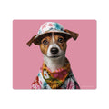 A vinyl mouse pad with a whimsical dog head design, featuring a brown and white dog wearing a multicolored floral shirt and a pink sun hat, on a pink background.