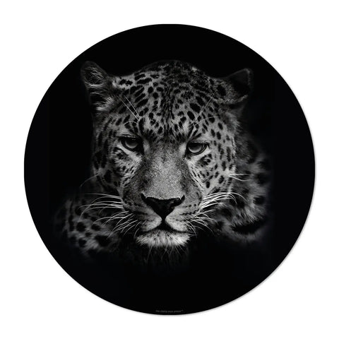 Our collection of black round vinyl placemats inspired by the majesty of wild felines: the Leopard. Each placemat in this collection showcases the incredible head of a wild feline, capturing the essence of these magnificent creatures. Made in Germany with premium vinyl quality, these elegant animal-inspired placemats transform your dining into a wild adventure. These designs will have you roaring with delight!