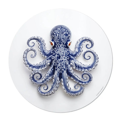 Elevate your dining experience with our round vinyl placemat featuring a captivating octopus design, inspired by Portuguese ceramic artistry. These placemats boast bold colors. Bring a touch of maritime charm to your table setting.