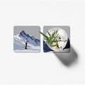 Two coasters with different designs on a white background