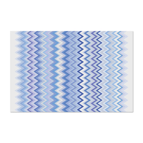Vinyl dense rug from the ZigZag collection ,118x180 cm cm size with shade of blue fashion zigzag patterns. Perfect for the living room or the kitchen areas, they are non-Slip and durable and perfect for indoor and outdoor use to enhance your floors.