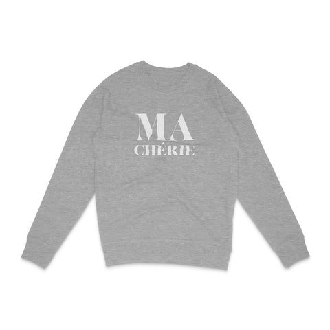 Dark grey unisex and minimalist sweatshirt in cotton with Ma Chérie french message in white. An essential trendy piece for all season and easy to associate with your wardrobe. Perfect gift as well for your loved ones. Available in several colors and with other French slogan because it’ s so chic !