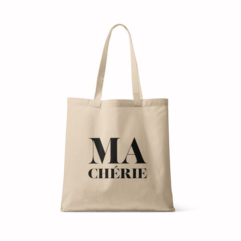 Natural tote bag with the French slogan Ma Chérie in black. Trend piece, this bag is eco friendly, small and easy to carry everywhere for your small stuff. Perfect daily bag and perfect gift for your lovers. Available in several colors and with different french funny messages.