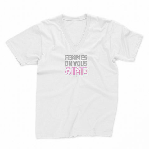 Women V Neck T shirt in white from the International Women's Rights Day collection with the message Femme on vous aime in black and magenta font. Fitted 100% cotton T-shirt with a strong feminist message to contribute to the fight for gender equality. Expressing your convictions is already a first step in this fight and in a stylish way. 